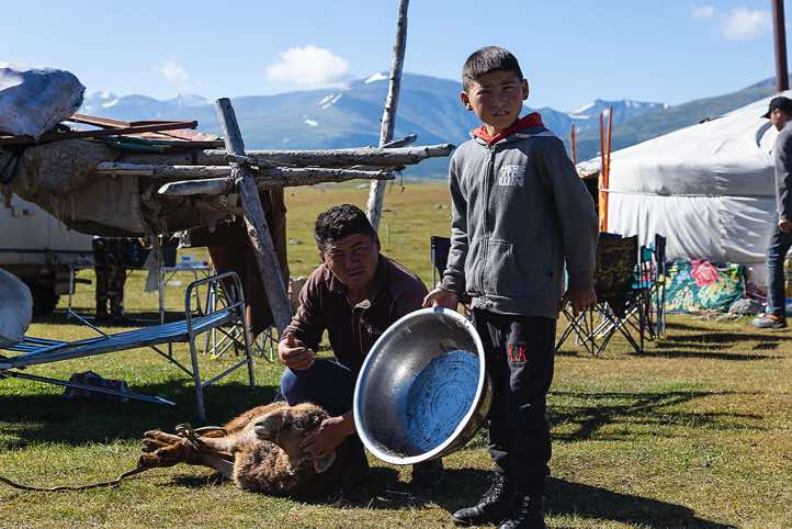 Preparations to kill a goat, Tavan Bogd National Park, Altai Mountains, Western Mongolia