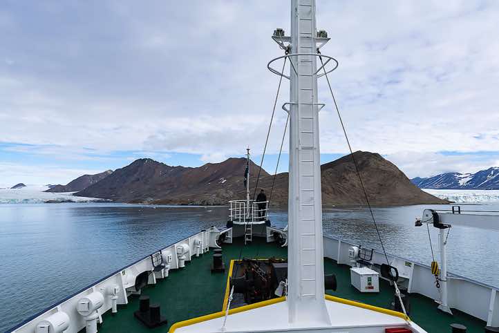 Expedition vessel Plancius near Valentinryggen mountain ridge, St. Jonsfjorden, Oscar II Land