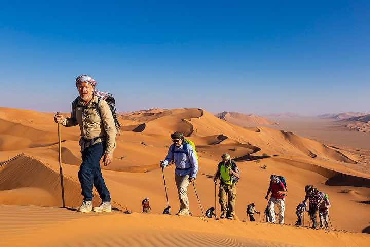 Jerome Blösser with hiking group in the sand dunes, desert landscape, Rub al Khali, Empty Quarter, Dhofar region