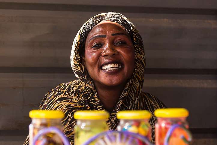 Sudanese woman preparing coffee or tea, Northern Sudan