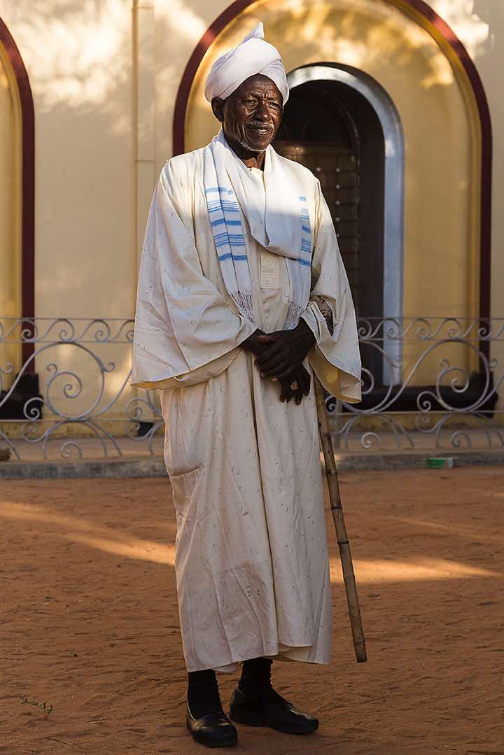 Old man in front of Mahdi's tomb, Khartoum