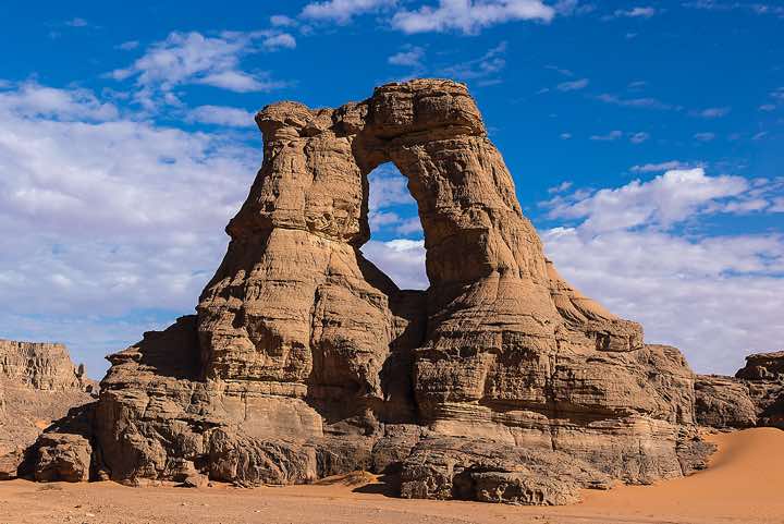 Natural window in Tamezguida or La Cathedrale, Tadrart region, Tassili n ́Ajjer National Park, Sahara, North Africa