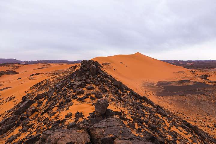 Sand dunes and rocks, Tadrart region, Tassili n ́Ajjer National Park, Sahara, North Africa