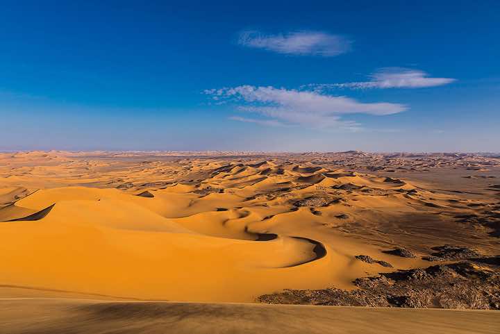 Sand dunes and claypan, southern Oued In Tehak, Tadrart region, Tassili n ́Ajjer National Park, Sahara, North Africa