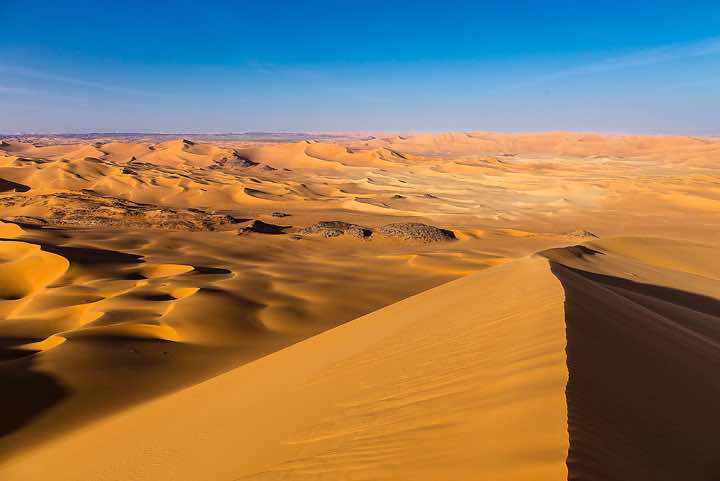 Sand dunes in different colours, southern Oued In Tehak, Tadrart region, Tassili n ́Ajjer National Park, Sahara, North Africa