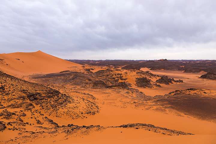 Sand dunes and rocks, Tadrart region, Tassili n ́Ajjer National Park, Sahara, North Africa