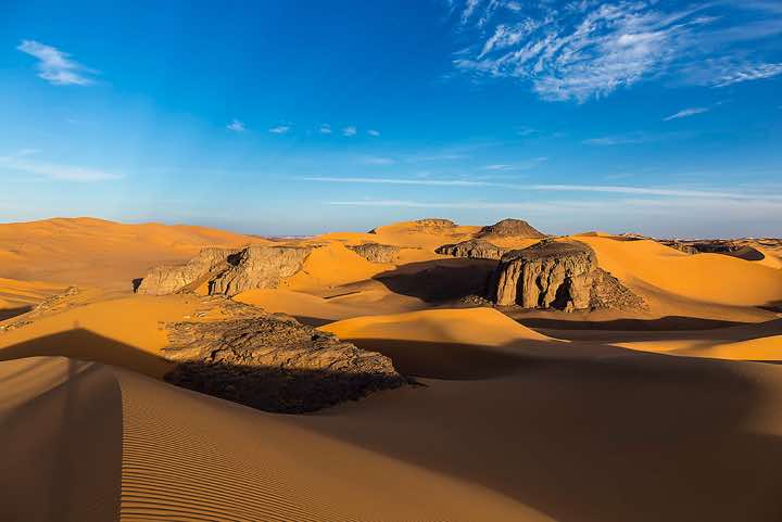 Sand dunes and rocks of Moul Naga, Tadrart region, Tassili n' Ajjer National Park, Sahara, North Africa
