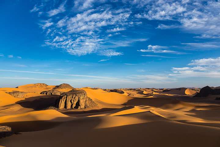 Sand dunes and rocks of Moul Naga, Tadrart region, Tassili n' Ajjer National Park, Sahara, North Africa