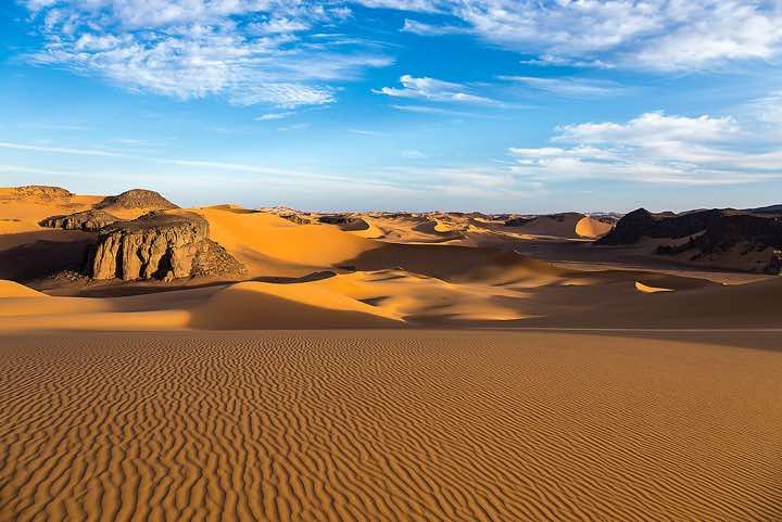Sand dunes and rocks of Moul Naga, Tadrart region, Tassili n' Ajjer National Park, Sahara, North Africa