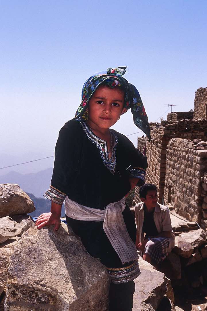 Girl in traditional dress, Jebel Rugab, Bura mountains