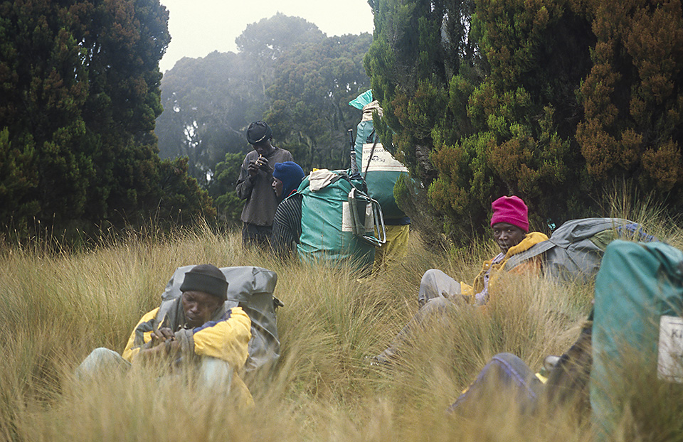 Resting porters on the Burguret route, Mount Kenya Trek